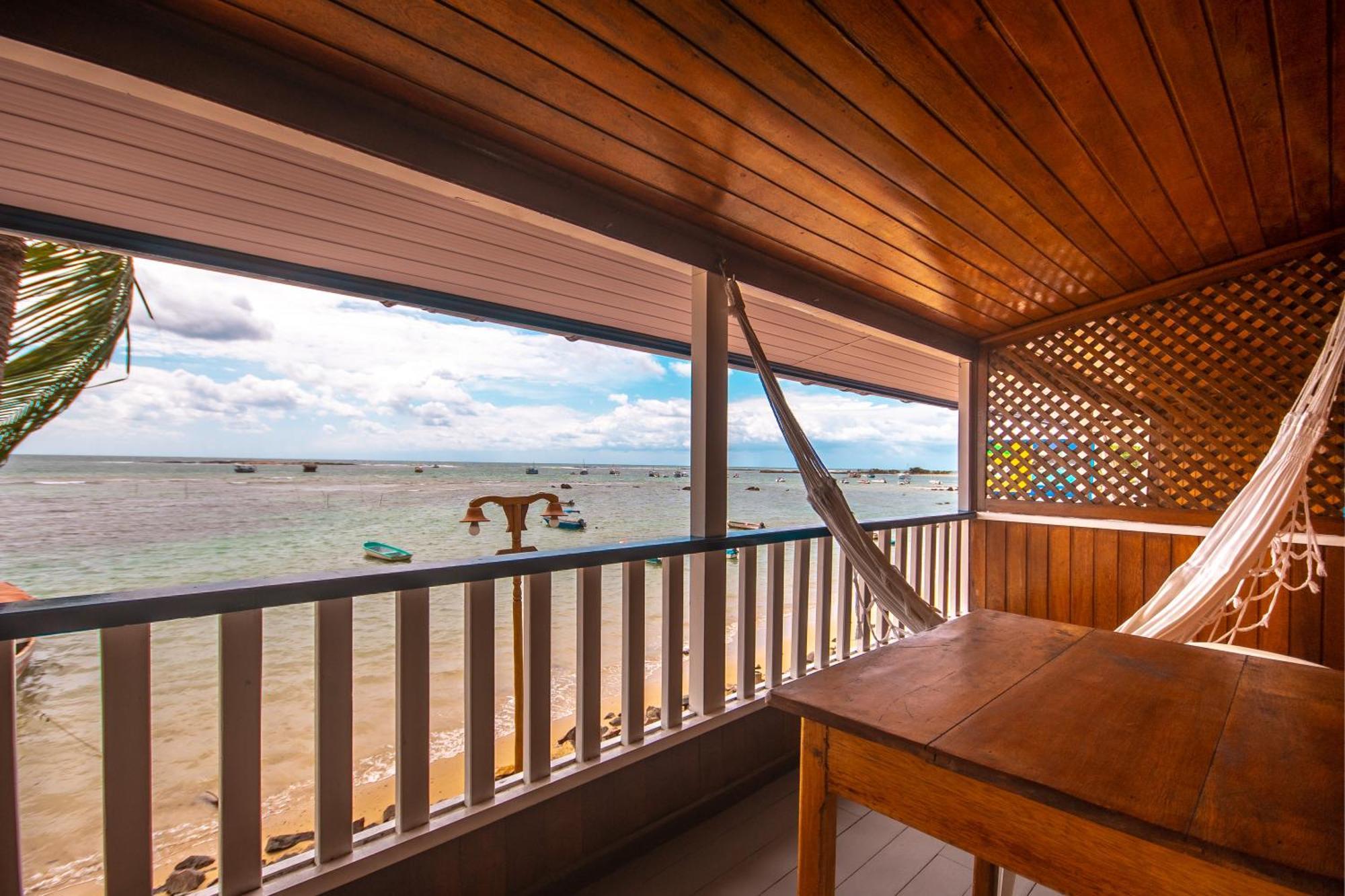 Quarto Quádruplo com Vista do Mar.