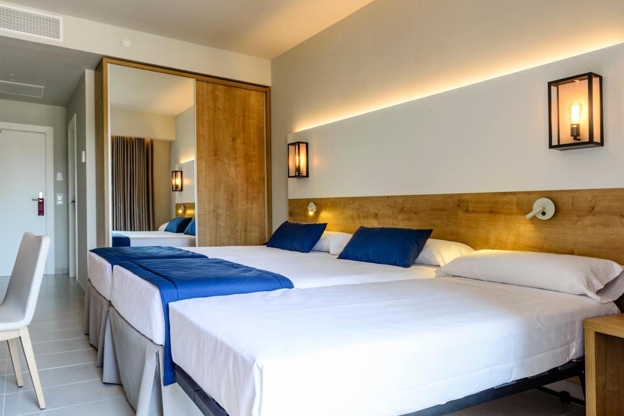 Tweepersoonskamer met 1 of 2 Bedden en Extra Bed