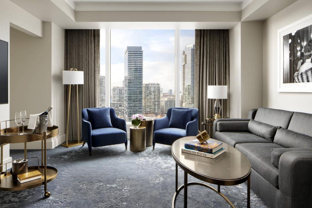 One Bedroom Corner Suite City View - 1 King bed, living room with sofabed