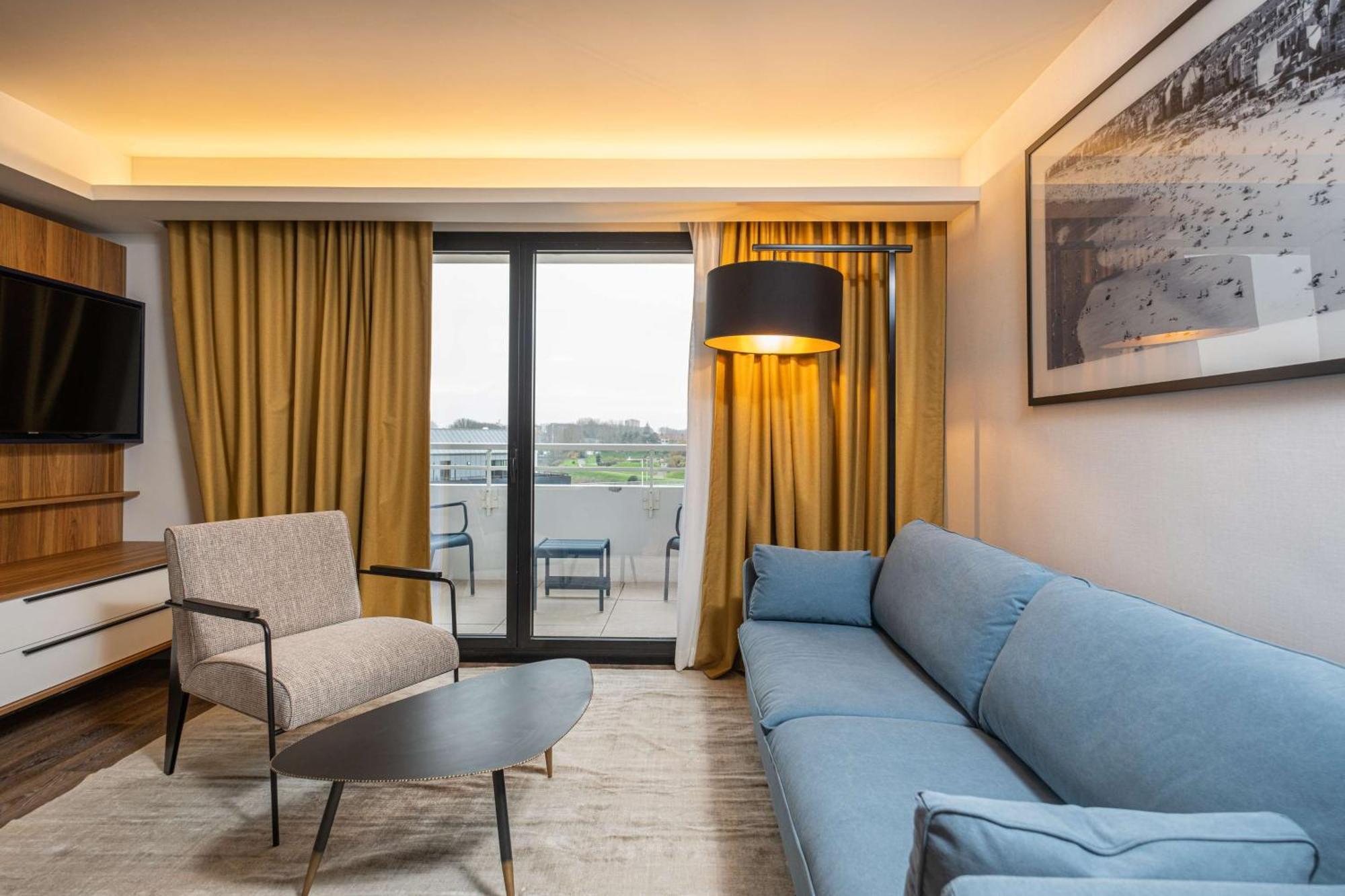 Suite with Balcony and City View