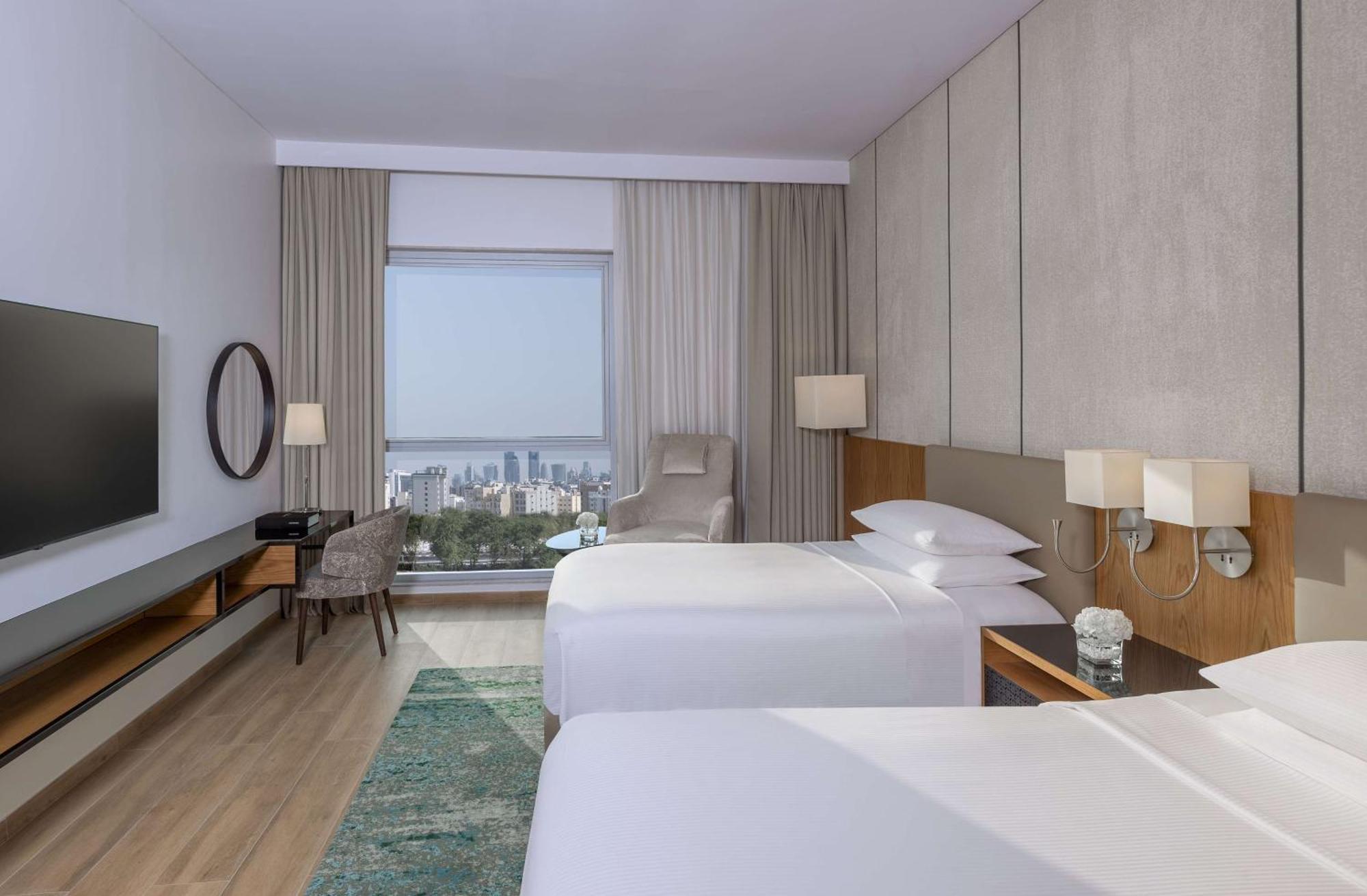Quarto com 2 Camas de Solteiro - Acesso à Área VIP
