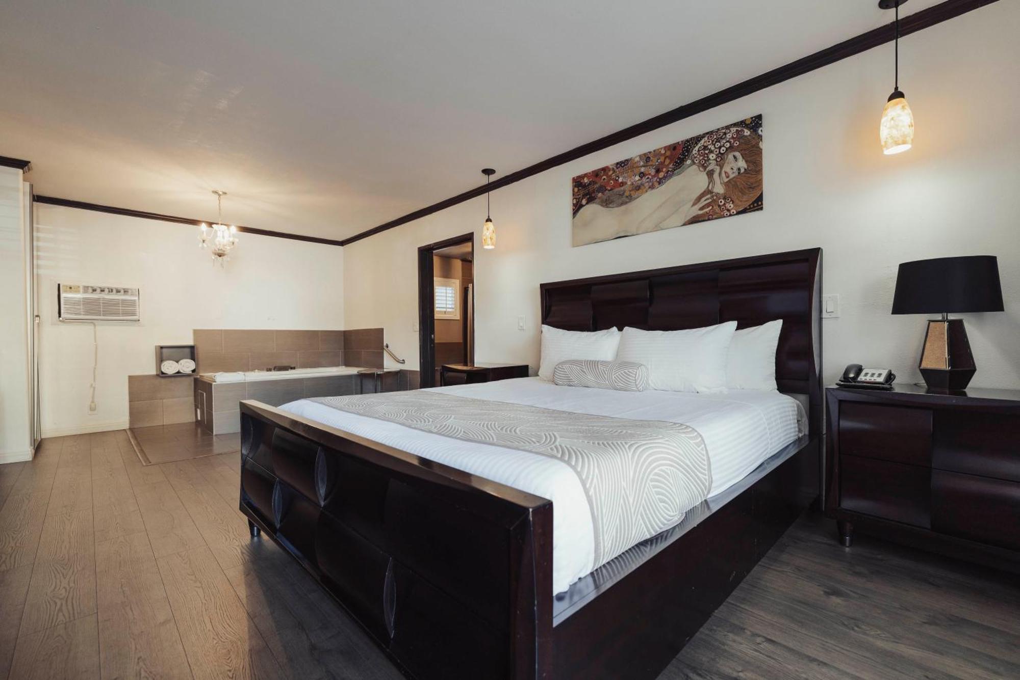 Suíte com Banheira de Hidromassagem - 1 Cama King-size