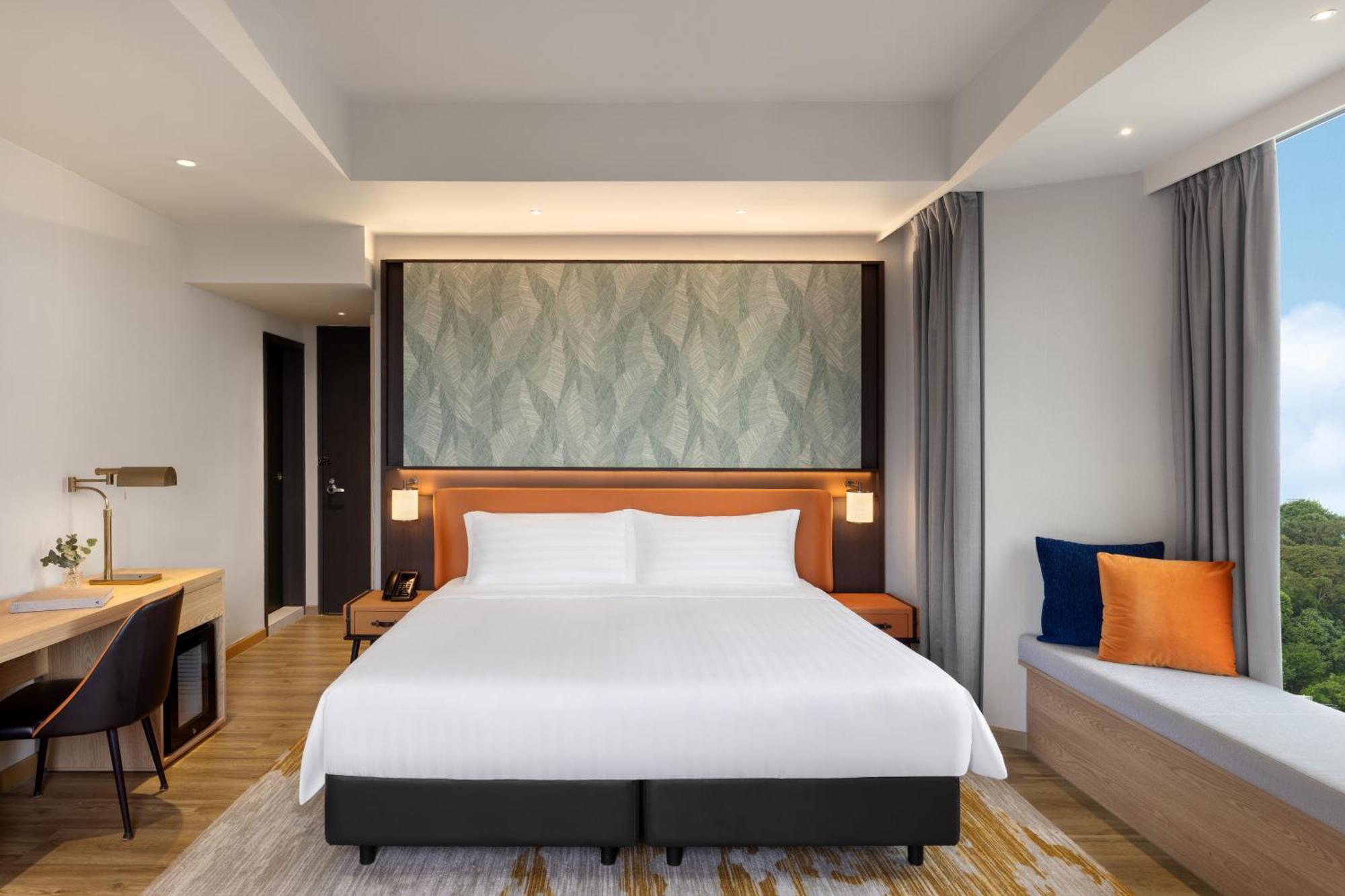 Deluxe Zimmer mit Kingsize-Bett und Stadtblick