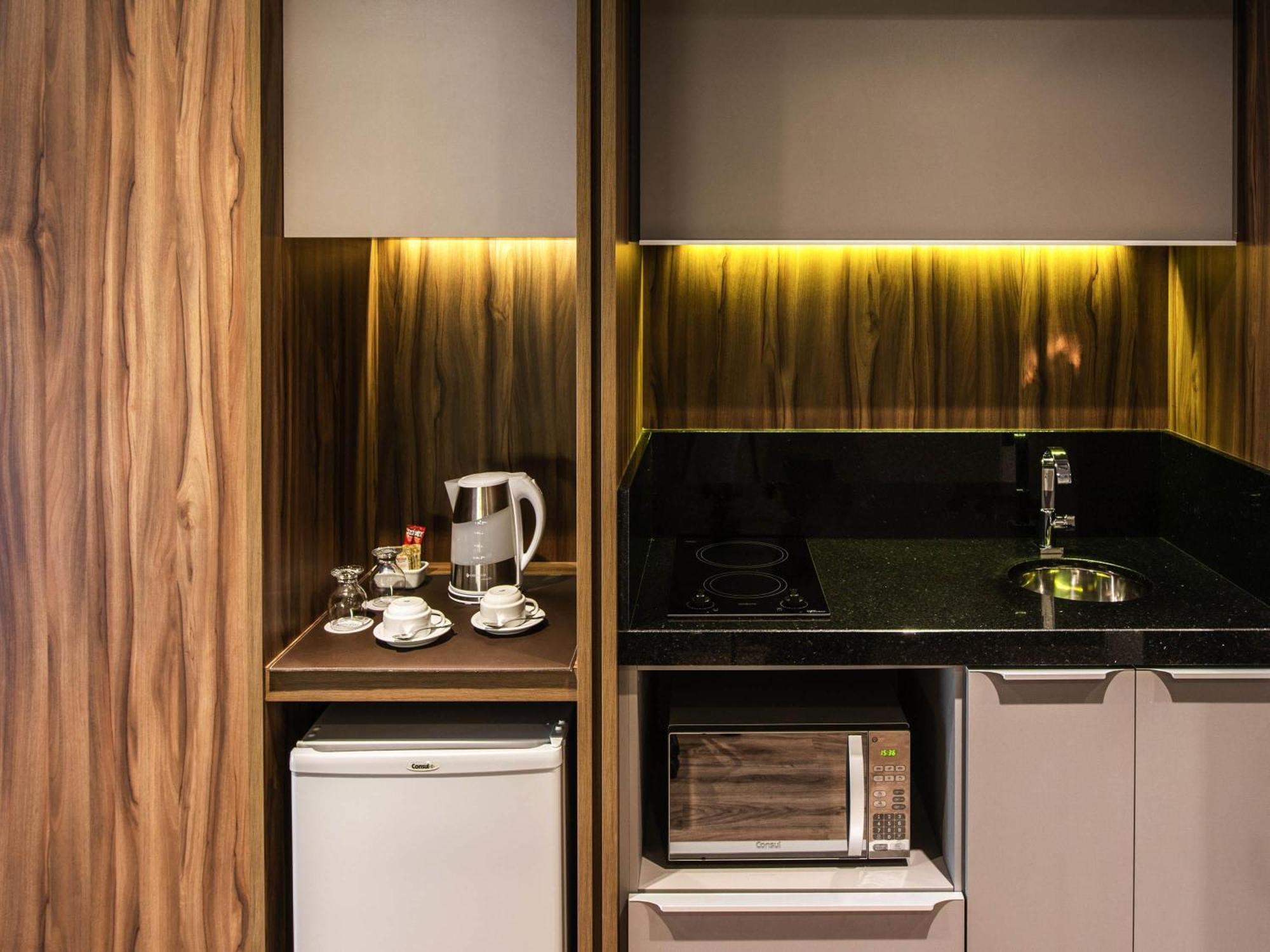 Apartamento Executivo com Cama King-size e Cozinha