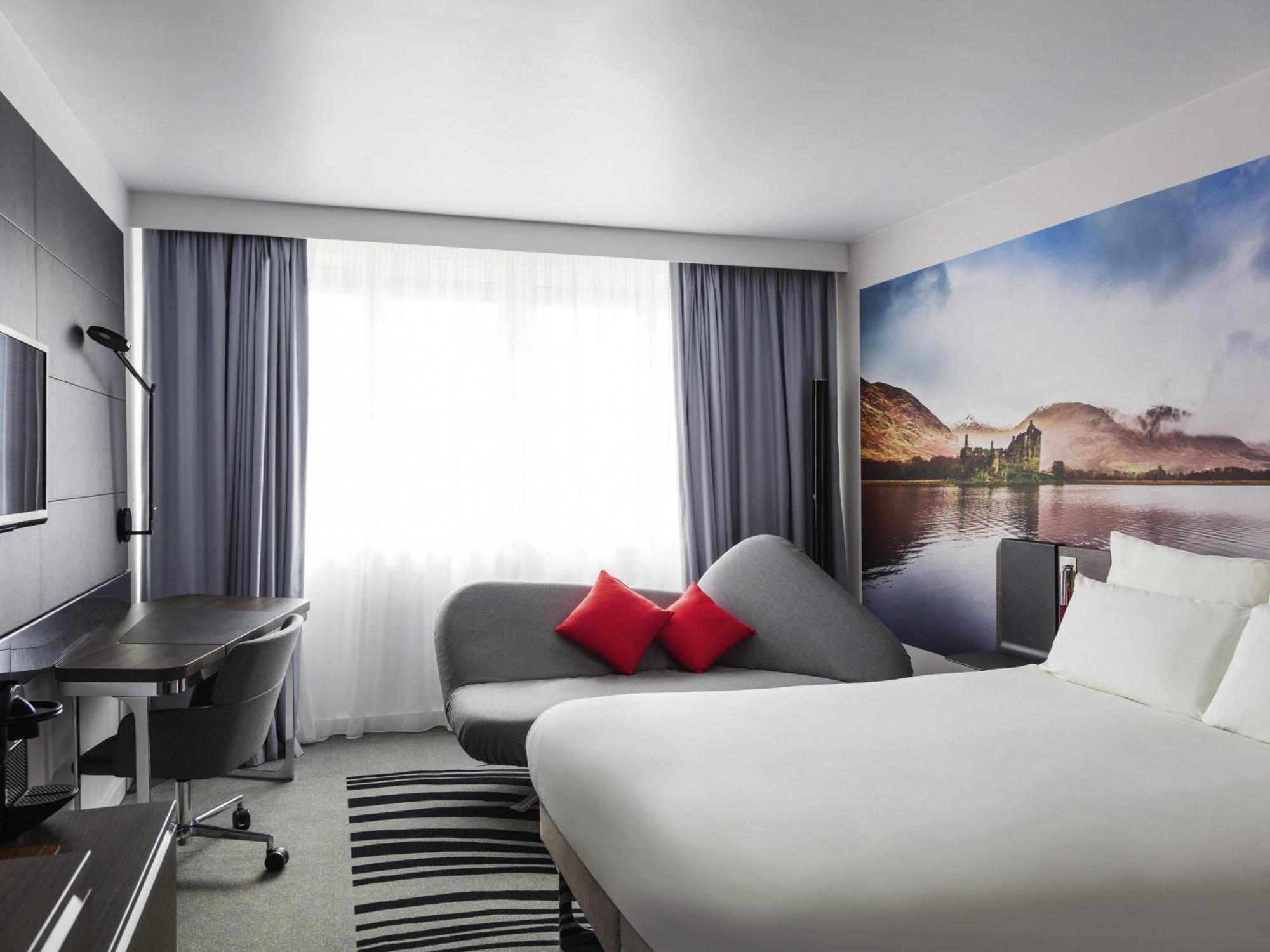 Executive Kamer met Queensize Bed en Bank