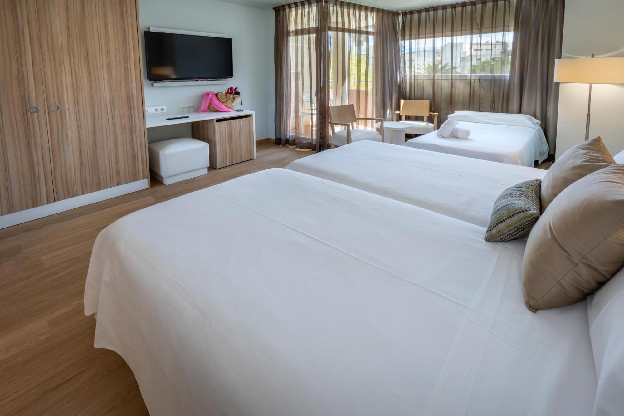 Triple Room (2 Adults + 1 Child) with Garden View