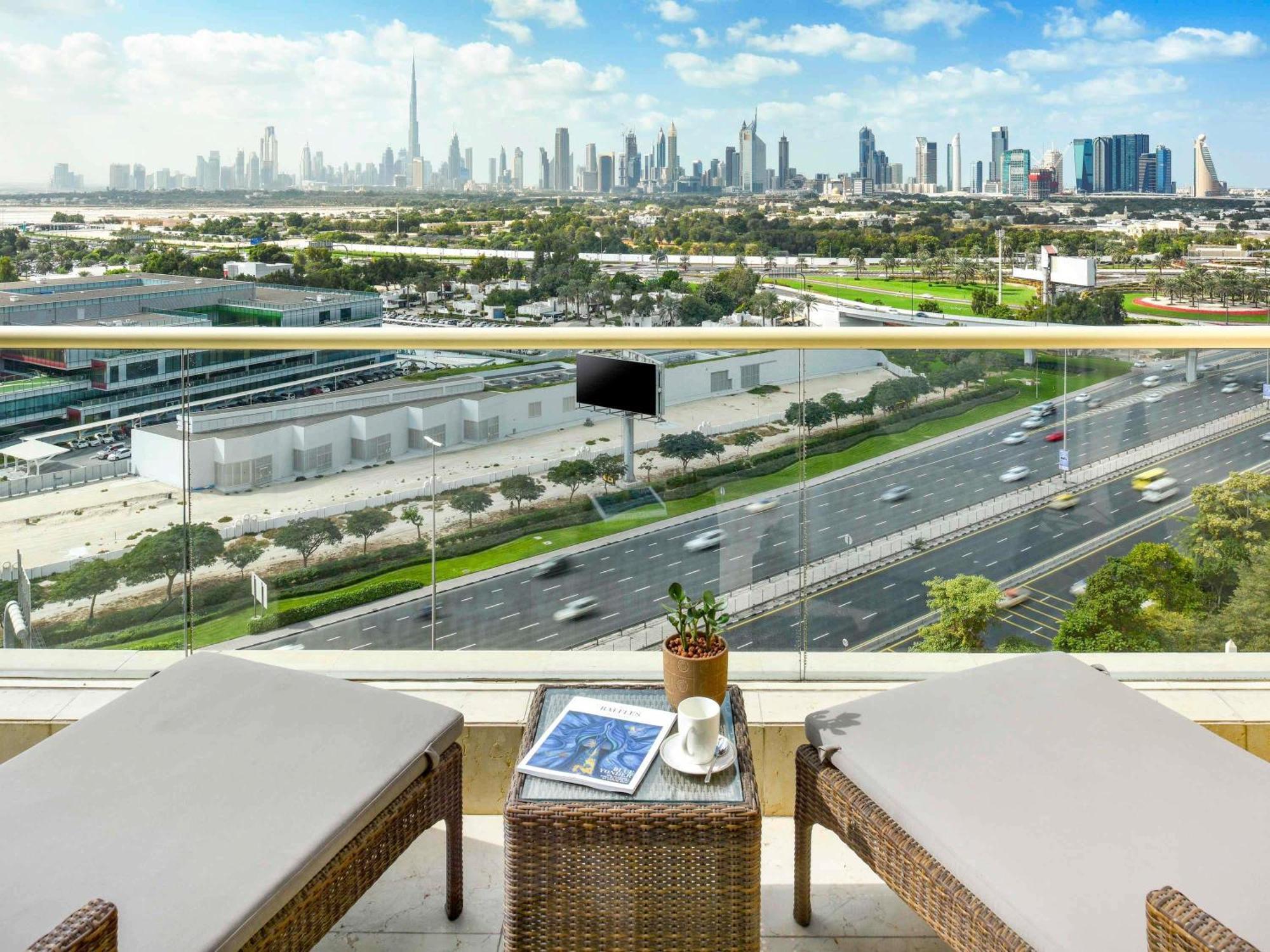 Raffles Club Room Terrace Skyline View & Club Lounge Access including Daily Evening Drinks & Canapes