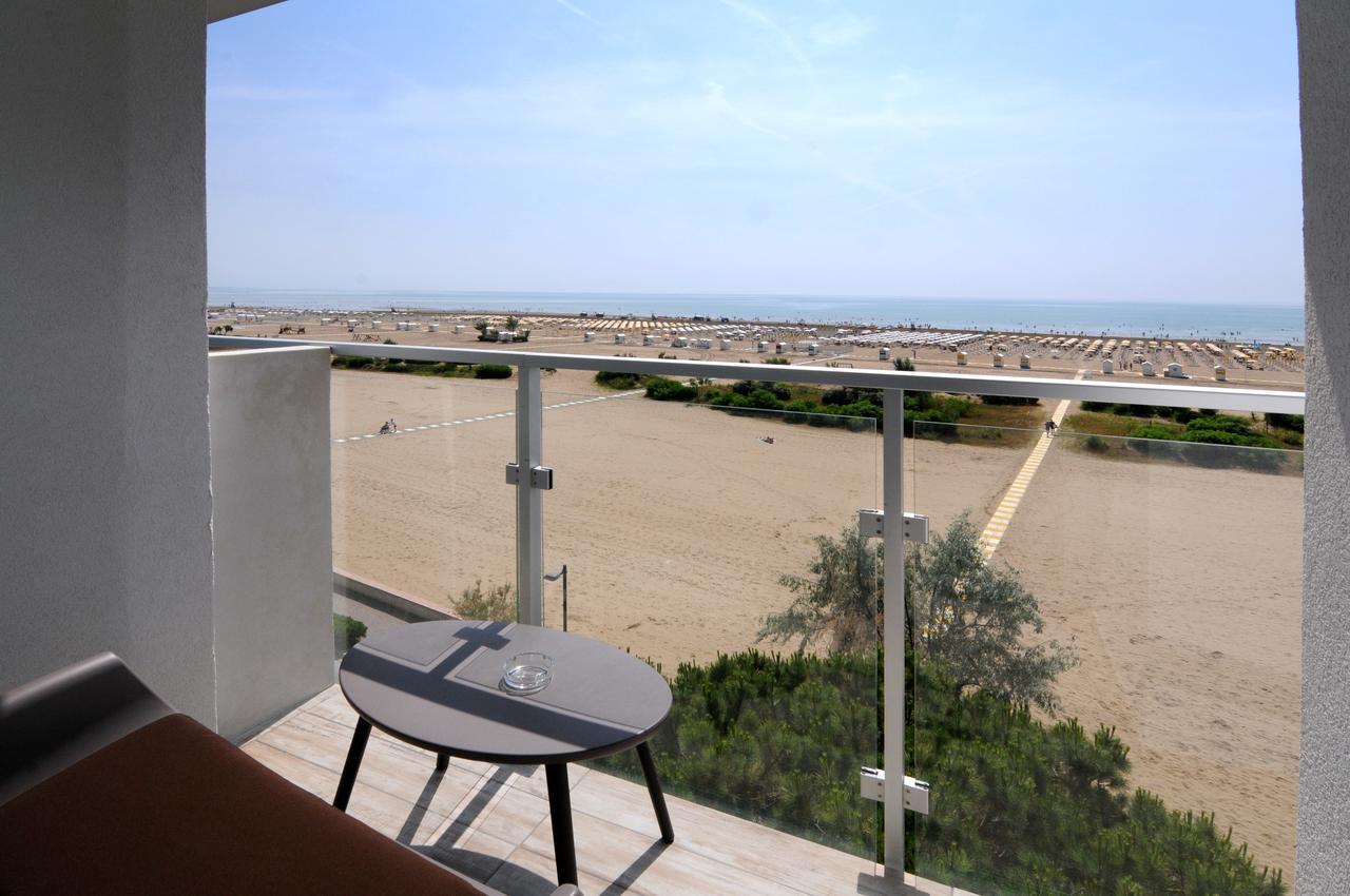 Quarto Triplo Deluxe com Varanda e Vista do Mar
