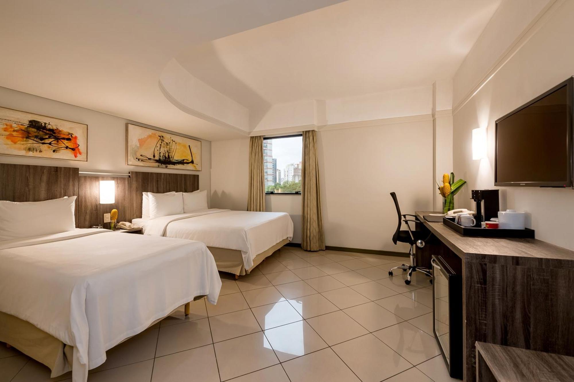 Quarto Duplo Superior com 2 Camas de Casal