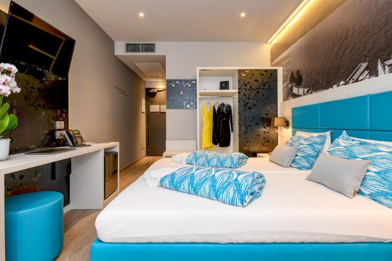 Comfort Tweepersoonskamer met 2 Aparte Bedden - Gedeeltelijk Uitzicht op Meer