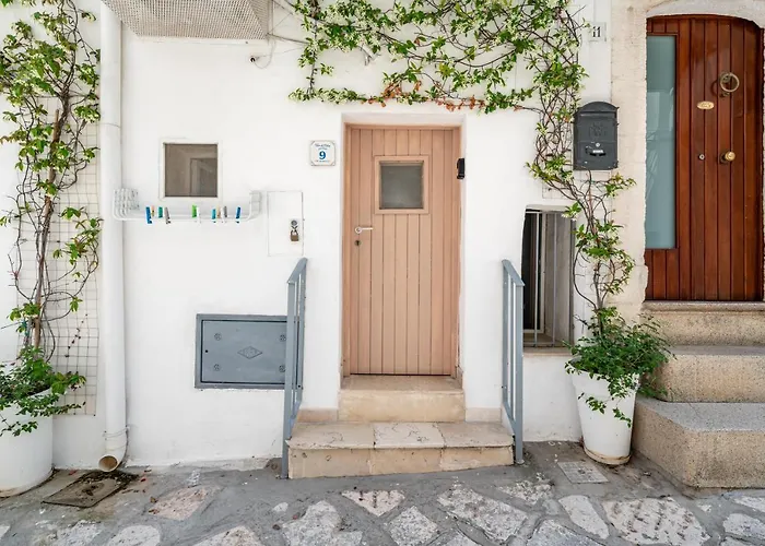 La villa: Vico di Ostuni Apartments by Typney